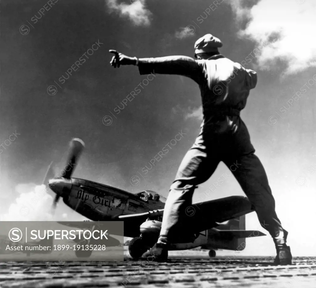 USA/Japan: A USAAF P-51 takes off from Iwo Jima, early 1945