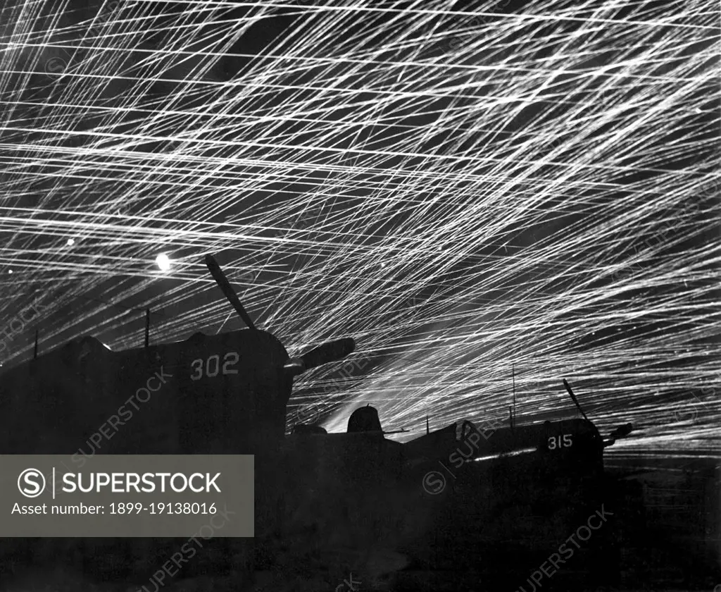 Japan/USA: Japanese night raiders are greeted with a barrage of anti-aircraft fire by the Marine defenders at Yontan airfield. Battle of Okinawa, May 1945