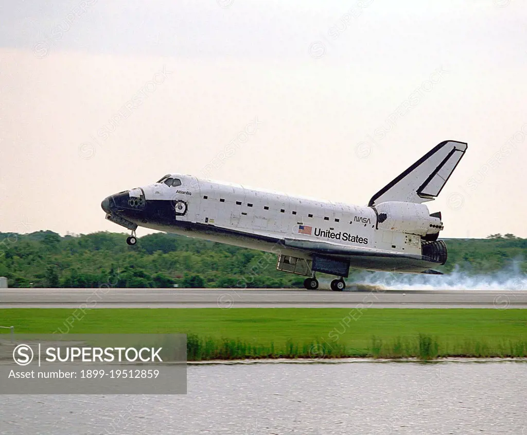 The Space Shuttle orbiter Atlantis touches down on Runway 33 of the KSC Shuttle Landing Facility, bringing to an end the nine-day STS-84 mission. Main gear touchdown was at 9:27:44 EDT on May 24, 1997.