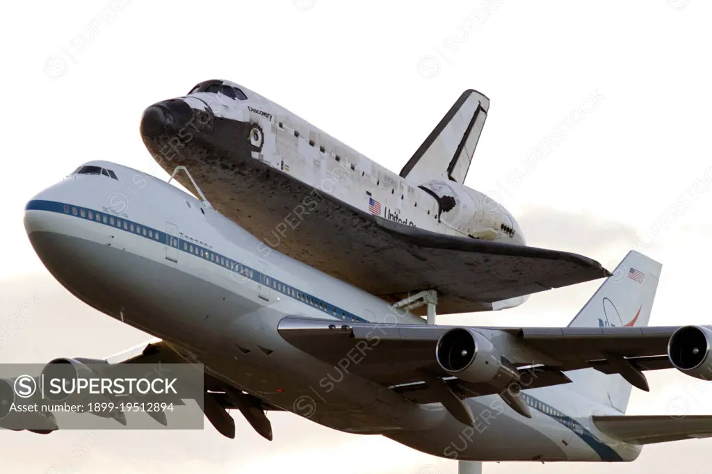 CAPE CANAVERAL, Fla. - A spectacular close up view of space shuttle Discovery, mounted to a Shuttle Carrier Aircraft, or SCA, after it takes off from NASA Kennedy Space Centers Shuttle Landing Facility runway 15 in Florida at 7 a.m. EDT.