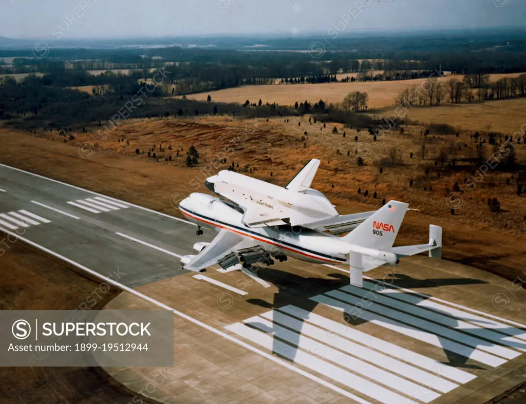 (13 March 1978) --- The space shuttle orbiter 101 Enterprise approaches riding atop its 747 carrier aircraft, arrives at the Redstone Arsenal airstrip near Marshall Space Flight Center (MSFC), Huntsville, Alabama, on March 13, 1978.