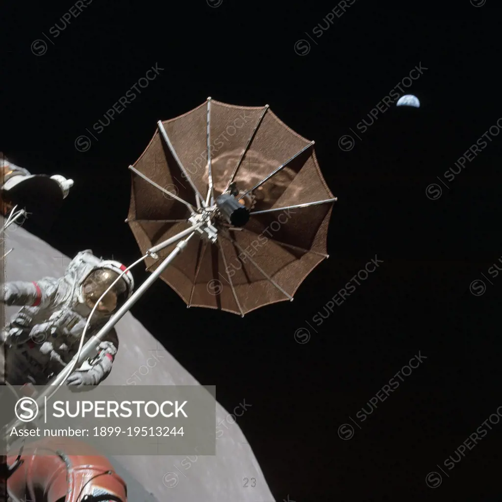 (13 Dec. 1972) --- Earth appears in the far distant background above the hi-gain antenna of the Lunar Roving Vehicle in this photograph taken by scientist-astronaut Harrison H. Schmitt during the third Apollo 17 extravehicular activity (EVA) at the Taurus-Littrow landing site.