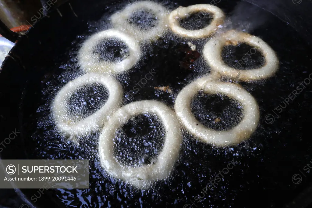 Traditional nepalese restaurant.   Fried Sel Roti, the traditional breakfast for nepali people..