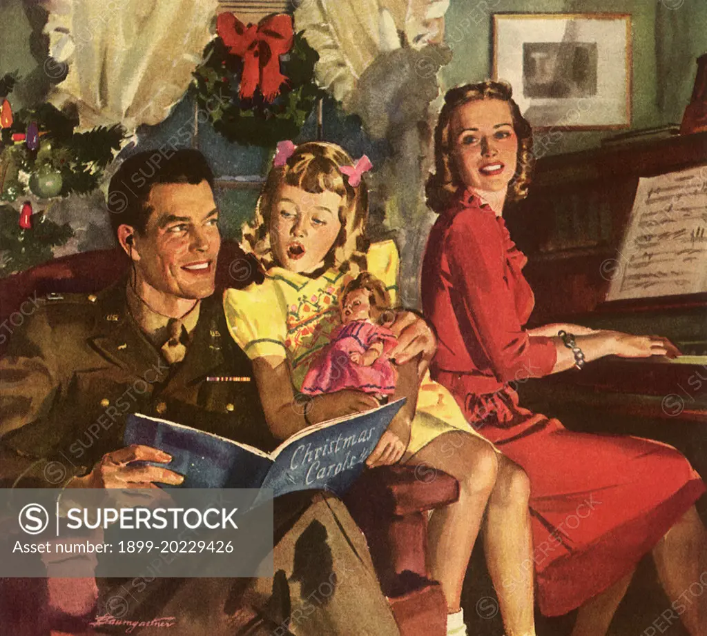 Soldier Dad in Chair as daughter &  mother sing carols. 