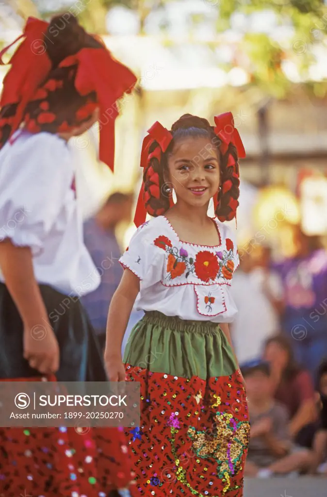 young girls prepare to dance, Ballet Folklorico, Cinco de Mayo Fiesta, La Mesilla, New Mexico