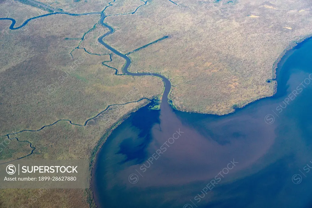 Aerial view of Blind River debouching into Lake Maurepas, Louisiana and its sediment plume..