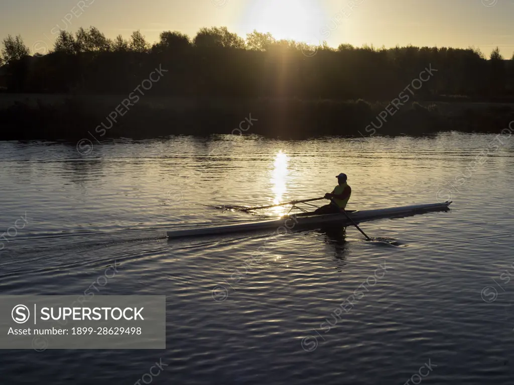 Sunrise with rowers on the Thames by St Helens Wharf, Abingdon.