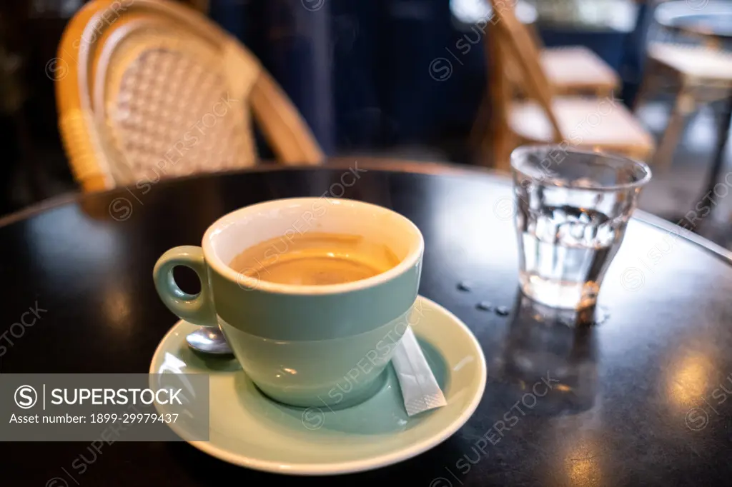 A cup of coffee at a cafe. Illustration of tourism and daily life in Greater Paris. France.