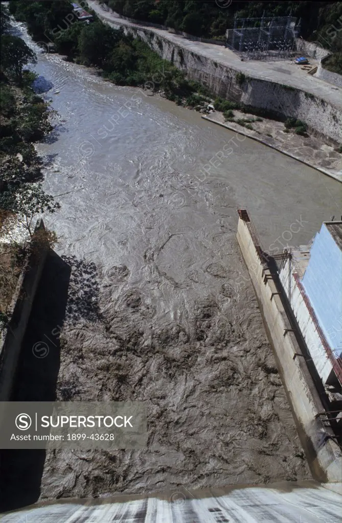 SILTED DAM RESERVOIR, HAITI. Central Plateau. Pelgre hydro-electric dam. Deforestation and subsequent erosion along the river, feeding the dam has caused the reservoir to fill up with top soil. . 