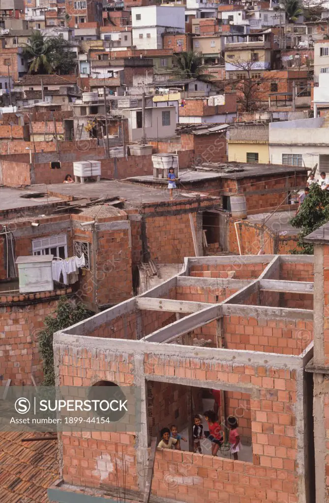 SLUMS, BRAZIL. Rio de Janeiro. Favela Rocinha. This is the largest shanty town in Rio, housing tens of thousands of the city s poorest families. . 