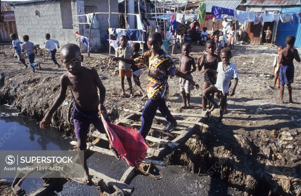 SLUMS, HAITI. Cite Soleil Shanty Town. Port-au-Prince. As the top soil leaves the countryside so do the peasants. . These environmental refugees are among the most disadvantaged people in the world. 