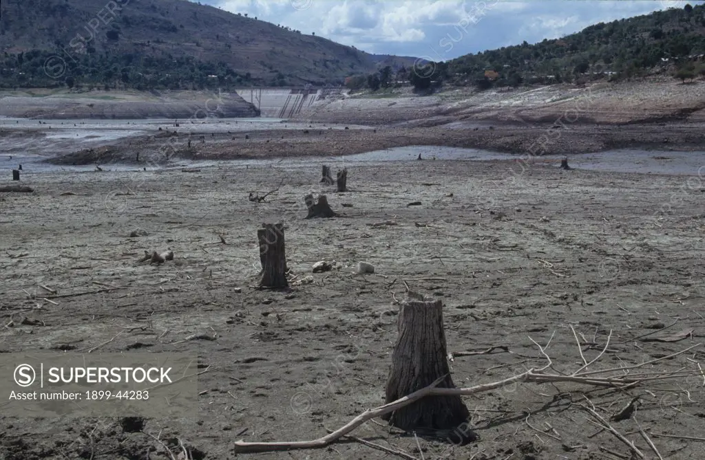 SILTED DAM RESERVOIR, HAITI. Central Plateau. Pelgre hydro-electric dam. . Deforestation and subsequent erosion along the river, feeding the dam has caused the reservoir to fill up with top soil. 