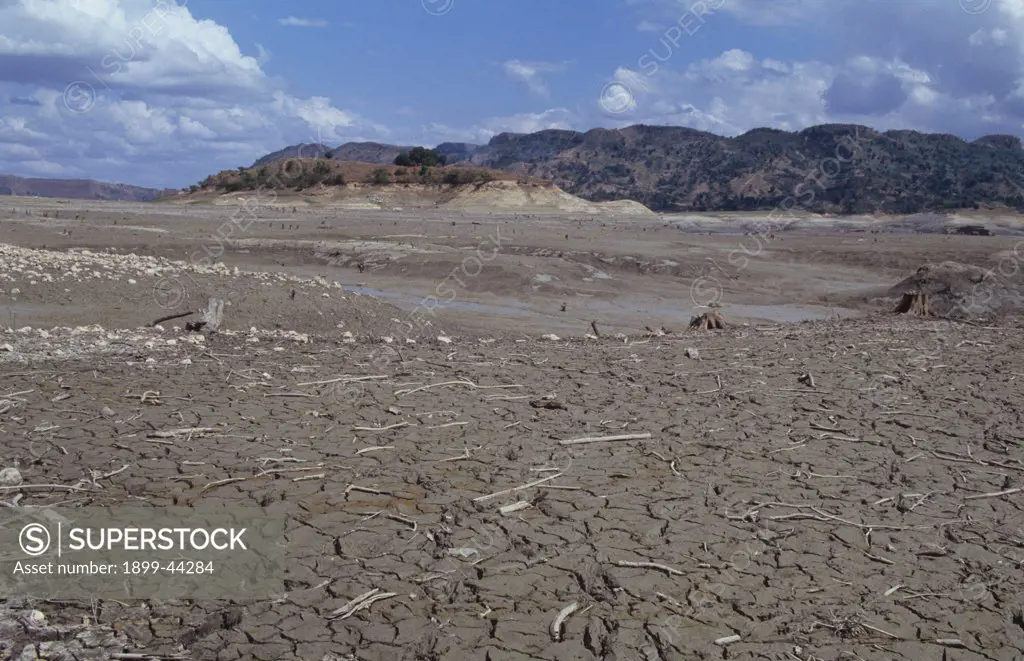 SILTED DAM RESERVOIR, HAITI. Central Plateau. Pelgre hydro-electric dam. . Deforestation and subsequent erosion along the river, feeding the dam has caused the reservoir to fill up with top soil. 