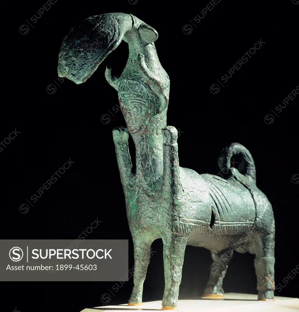 Bull with a Man's Head, by Unknown artist, 8th Century -7th Century b.C.,, Bronze. Italy: Sardegna: Cagliari: Cagliari: National Archaeological Museum. Perspective view bull with a man's head