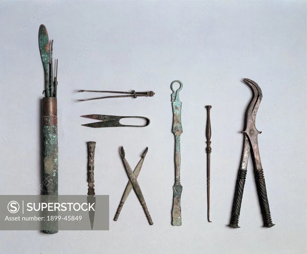 Surgical instruments, by Unknown artist, 1st Century, bronze and copper alloy. Italy: Campania: Naples: National Archaeological Museum: 116444. Surgical instruments kit probe spatula probes pincers/tongs scissors pliers box cutter scalpel/lancet hooked spoon