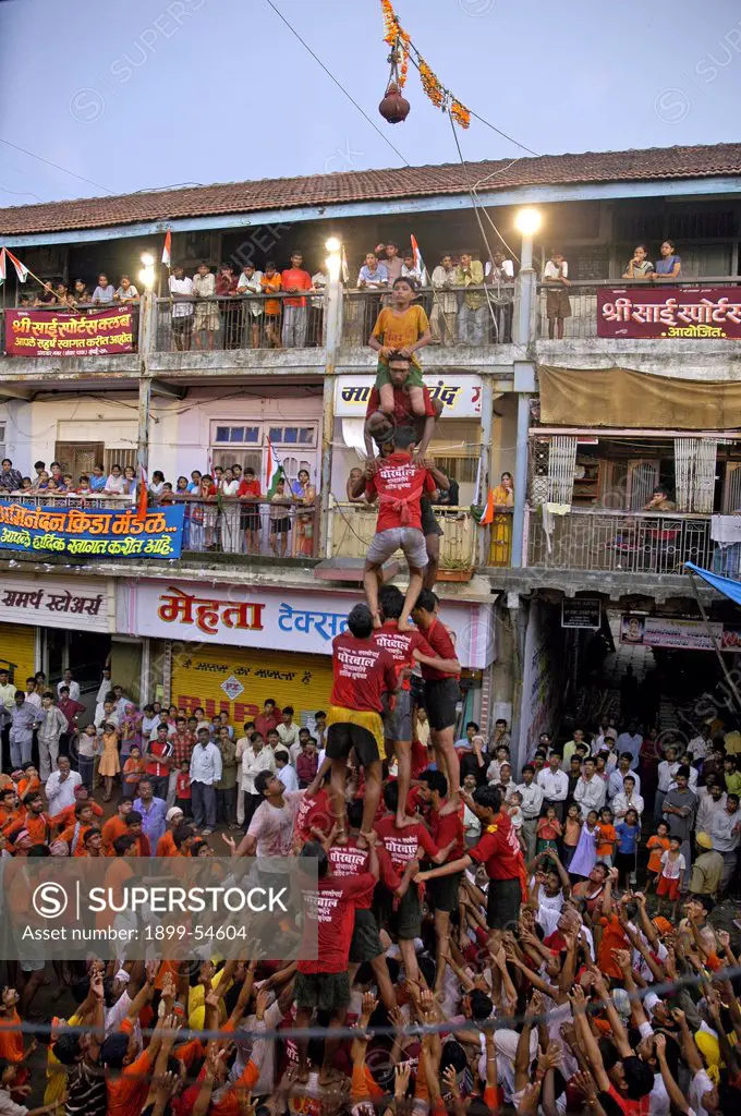 Indian Festival Janmashtami Lord Krishna Birthday Celebrated By Human Pyramid Breaking Pot Of Curd