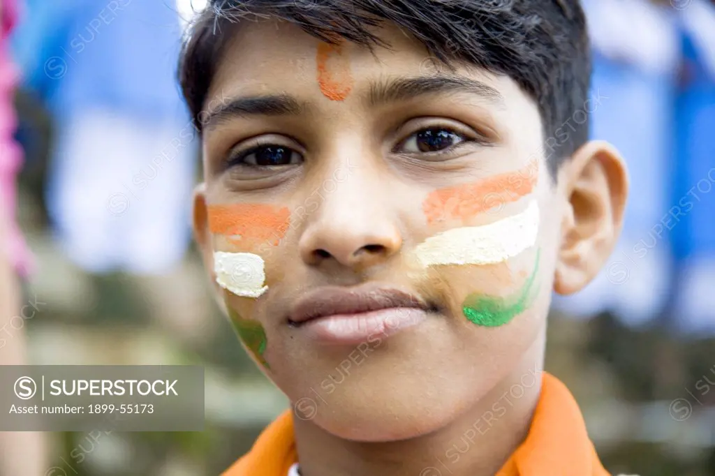 School Boy With Indian Tri-Color, Flag Painted On His Face For Independence Day Celebration Of Nation 15Th August, Village Delwara, Udaipur, Rajasthan, India