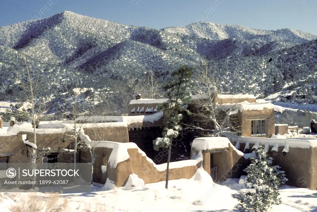 New Mexico, Santa Fe. Adobe Buildings In Winter