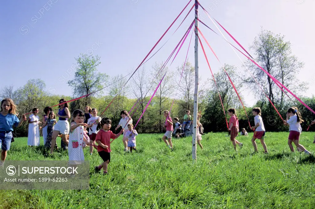 May Day. Children Dancing Around Maypole.