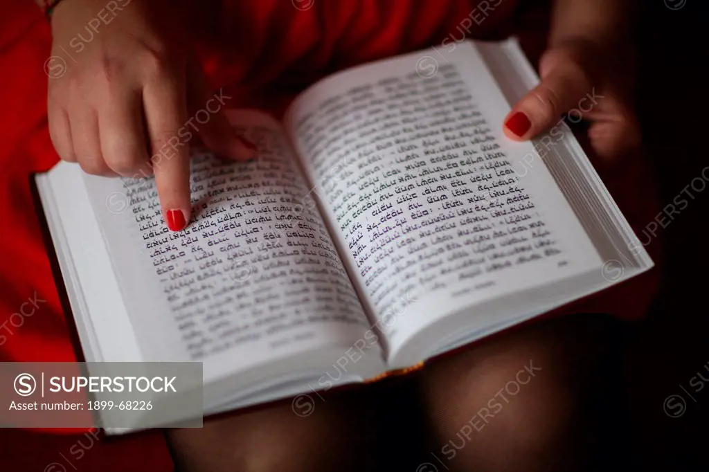 Jewish Woman Reading a Torah