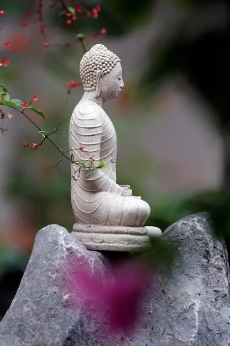 Stone Buddha statue. Hoi An. Vietnam.