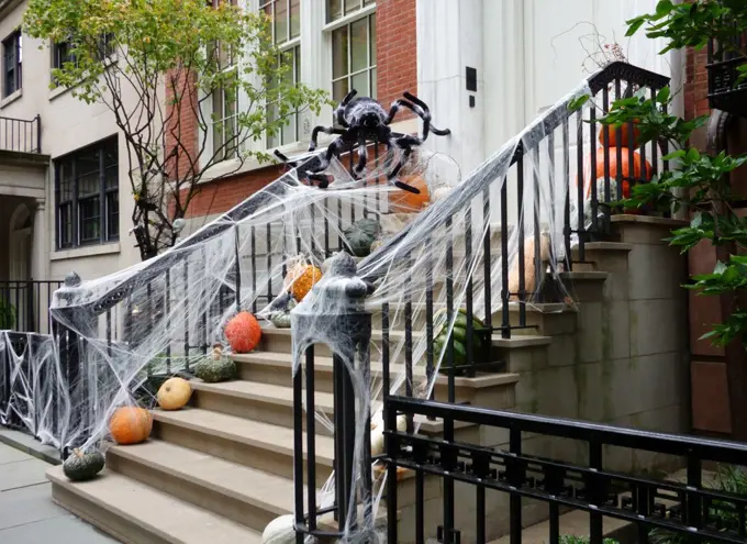 Brownstone stoop decorated during Halloween. (Photo by: Joan Slatkin/UIG)