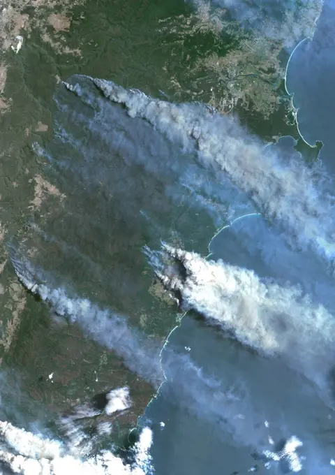 Color satellite image of bushfires in Batemans Bay on the South Coast region of New South Wales, Australia. Image collected on December 31, 2019 by Sentinel-2 satellites.