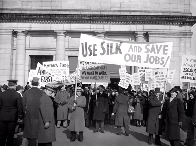 January 28, 1938 - Members of the American Federation of Hosiery Workers arriving today at Union Station today from they staged a parade to the White House as a protest against the boycott of Japanese silk.