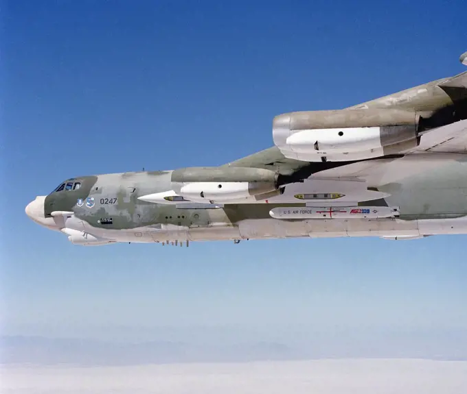 1979 - A right side view of a B-52 Stratofortress aircraft carrying an AGM-109 Tomahawk air-launched cruise missile..