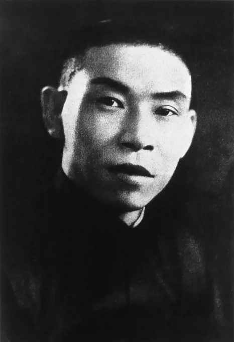 Du Yuesheng (Tu Yüeh-sheng), commonly known as 'Big-Ears Du' (1887-1951) was a Chinese gangster who spent much of his life in Shanghai. He was a key supporter of the Kuomintang (KMT; aka Nationalists) and Chiang Kai-shek in their battle against the Communists during the 1920s, and was a figure of some importance during the Second Sino-Japanese War. After the Chinese Civil War and the KMT's retreat to Taiwan, Du went into exile in Hong Kong and remained there until his death in 1951. According to a contemporaneous description: Du Yuesheng is short and slender, with long arms, a shaven head, large yellow teeth and large ears that stick out. He is always accompanied by armed bodyguards, and his home is a fortified drug depot, well stocked with guns and ammunition. Upon entering, the visitor finds the entrance hall lined on both sides with stacks of rifles and sub-machine guns. The house has three floors - on each floor he keeps one of his three wives. He speaks no foreign languages, yet i