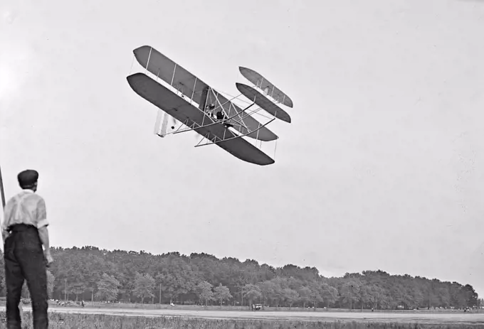 Wright Brothers airplane in flight at Fort Myer Virginia circa 1909. 