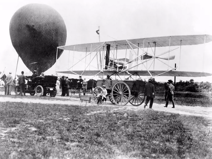 1908 - The Wright Brothers Flyer arrives at Fort Myer, Virginia (VA) aboard a wagon, attracting the attention of children and adults. 