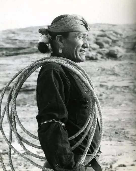 Arizona, circa 1935 - Hostin Bekini (Ralph Gray) with rawhide lariat made by himself.