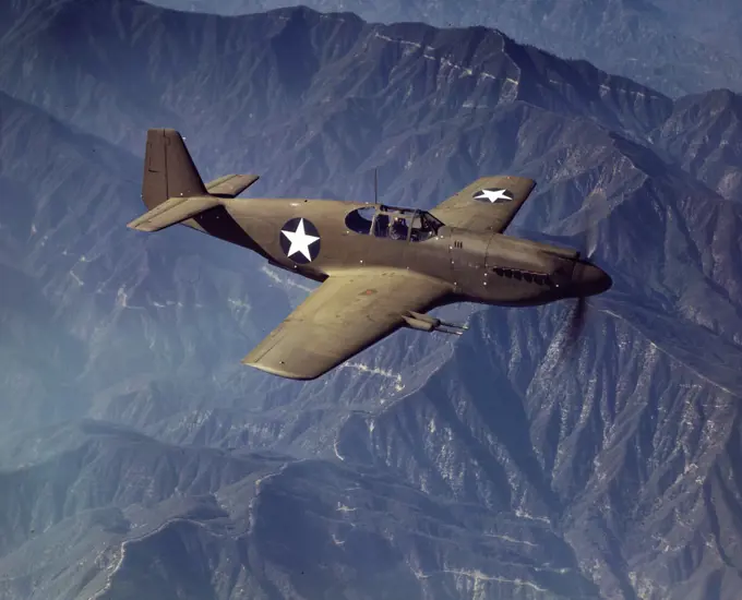 P-51 'Mustang' fighter in flight, Inglewood, Calif. The 'Mustang', built by North American Aviation, Incorporated, is the only American-built fighter used by the Royal Air Force of Great Britain - October 1942. 