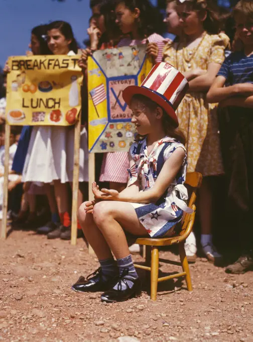 May 1942 - school student in Southington Connecticut wearing patriotic hat. 