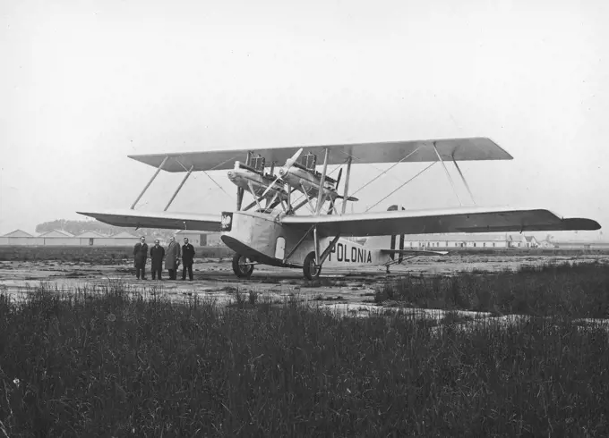 Visible: Polish American activist Adamkiewicz (2nd on the right), lieutenant pilot of the reserve from PLL 'Lot' Wodzimierz Klisz (3rd on the right), captain pilot from the 3rd Air Regiment Adam S. Kowalczyk (1st on the left).. 