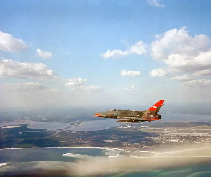 1981 - An air-to-air left side view of a QF-100D Super Sabre aircraft.. 