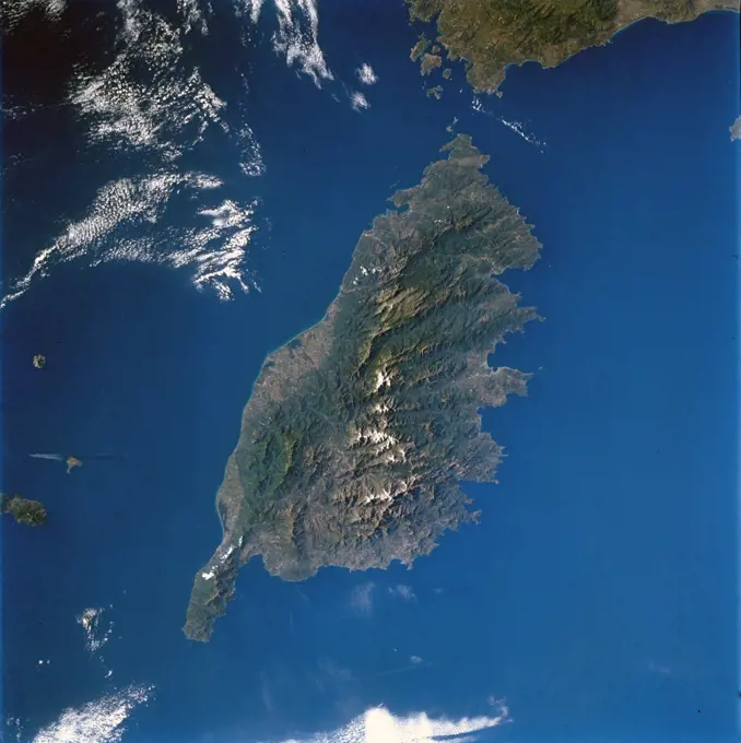 (15-24 May 1997) --- This 70mm image of the island of Corsica was photographed from the Space Shuttle Atlantis during the STS-84 mission. Birthplace of Napoleon Bonaparte, Corsica is the fourth largest island (after Sicily, Sardinia, and Cyprus) in the Mediterranean. Two-thirds of the island is mountainous with the majority of the population (1990-249, 737) living on the east coast (the 'handle on the island points north). French is the official language.. 