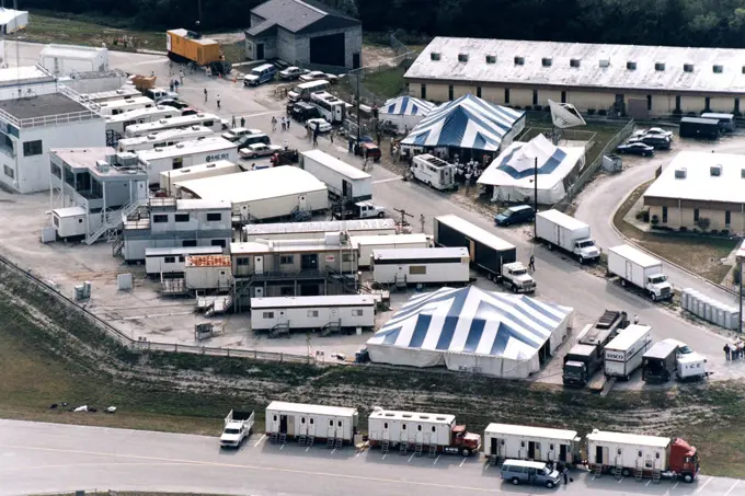 The filming of scenes for the movie 'Contact' by Warner Bros.' cast and crew at Kennedy Space Center's Launch Complex 39 Press Site on January 29 is captured by cameras on the roof of the Vehicle Assembly Building. The screenplay for 'Contact' is based on the best-selling novel by the late astronomer Carl Sagan. The cast includes Jodie Foster, Matthew McConaughey, John Hurt, James Woods, Tom Skerritt, David Morse, William Fichtner, Rob Lowe and Angela Bassett. Described by Warner Bros. as a science fiction drama, 'Contact' will depict humankind's first encounter with evidence of extraterrestrial life. 