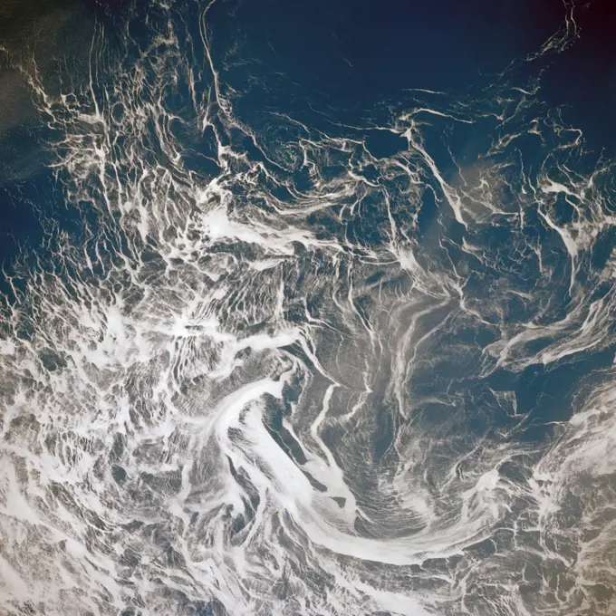 (28 April-6 May 1991) --- This nearly vertical photograph of the North Atlantic, taken outside of the sunglint pattern, illustrates the extreme contrast between highly reflective ice, having a large percentage of between-crystal air space, and the low-reflectance water, which absorbs most of the light that propagates into it from the air.  Photographs such as this, taken several times over the course of a mission, may be used to investigate near-surface circulation in high-latitude oceans. . 