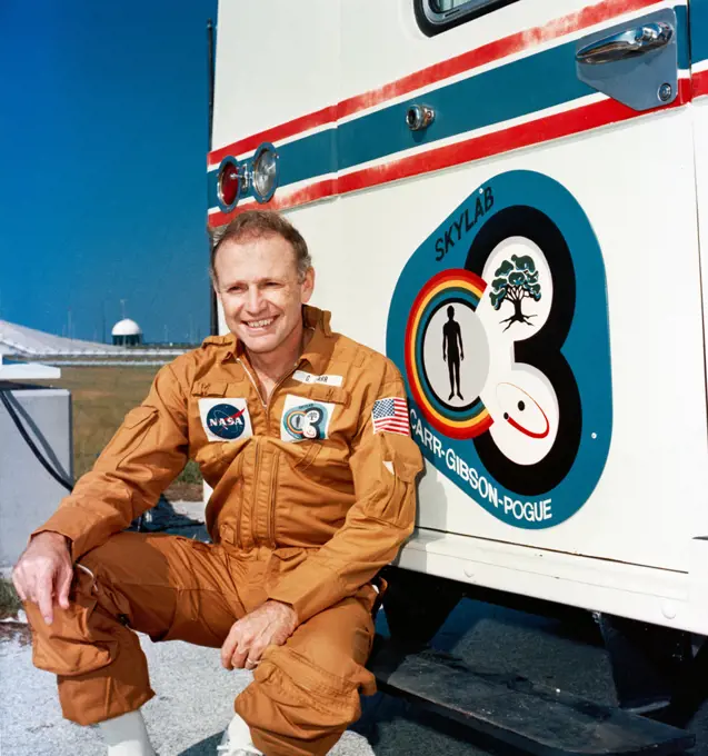 (8 Nov. 1973) --- Astronaut Gerald P. Carr, commander of the Skylab 4 mission, relaxes on the running board of the transfer van during a visit to the Skylab 4/Saturn 1B space vehicle at Pad B, Launch Complex 39, at the Kennedy Space Center, Florida.. 