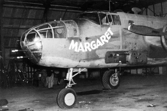 USA/Australia: B-25 Mitchell medium bomber gunship 'Margaret' of the 90th Squadron, 3rd Bomb Group in a hangar at Garbutt airfield, Queensland, c. 1942