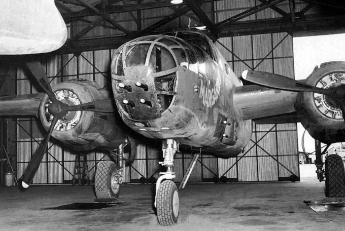 USA/Australia: B-25 Mitchell medium bomber gunship 'Margaret' of the 90th Squadron, 3rd Bomb Group in a hangar at Garbutt airfield, Queensland, c. 1942