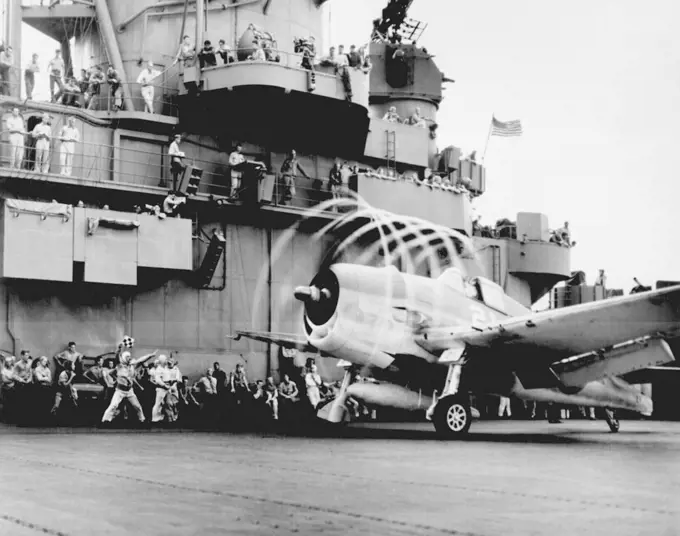 USA: US Navy Grumman F6F Hellcat fighter preparing to launch off USS Yorktown to attack a target in the Japanese-controlled Marshall Islands, 20 November 1943