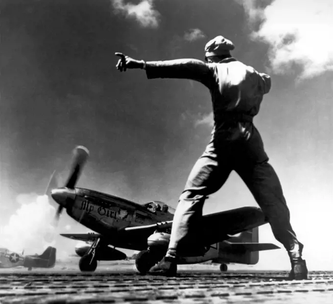 USA/Japan: A USAAF P-51 takes off from Iwo Jima, early 1945