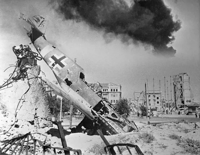 Russia/Germany: A downed German fighter (Me 109) lies amid the ruins of Stalingrad. Huge air battles were waged over the city during the course of the siege, 1942-1943