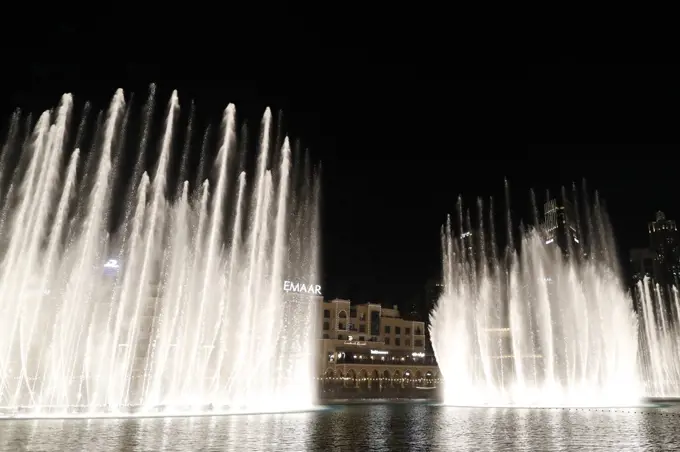 The dubai mall fountain show at night. Dubai. United Arab Emirates.