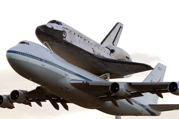 CAPE CANAVERAL, Fla. - A spectacular close up view of space shuttle Discovery, mounted to a Shuttle Carrier Aircraft, or SCA, after it takes off from NASA Kennedy Space Centers Shuttle Landing Facility runway 15 in Florida at 7 a.m. EDT.