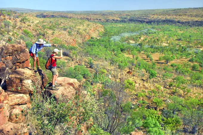 Clifftop tourists (Butch Maher, left) and Anja Skrobin)   in Kimberley wilderness.  Marion Downs Wildlife Sanctuary, northern Western Australia