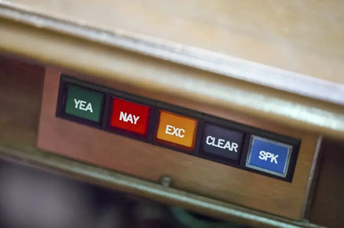 Colored voting buttons at senate desk,  Annapolis, MD. (Photo by: Edwin Remsburg/VW Pics)